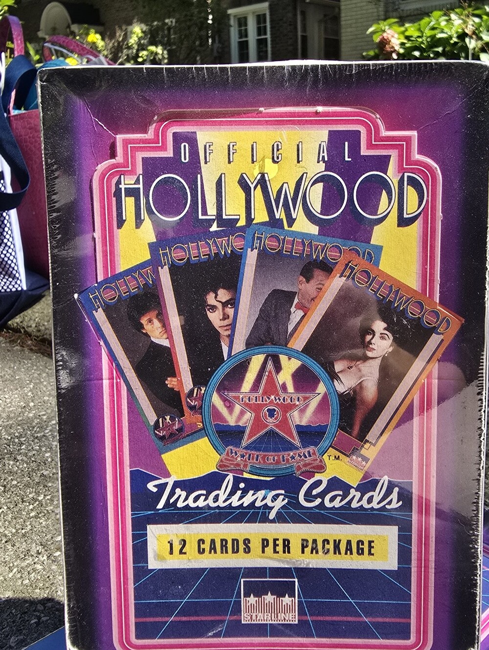 Factory sealed box of Official Hollywood trading cards.